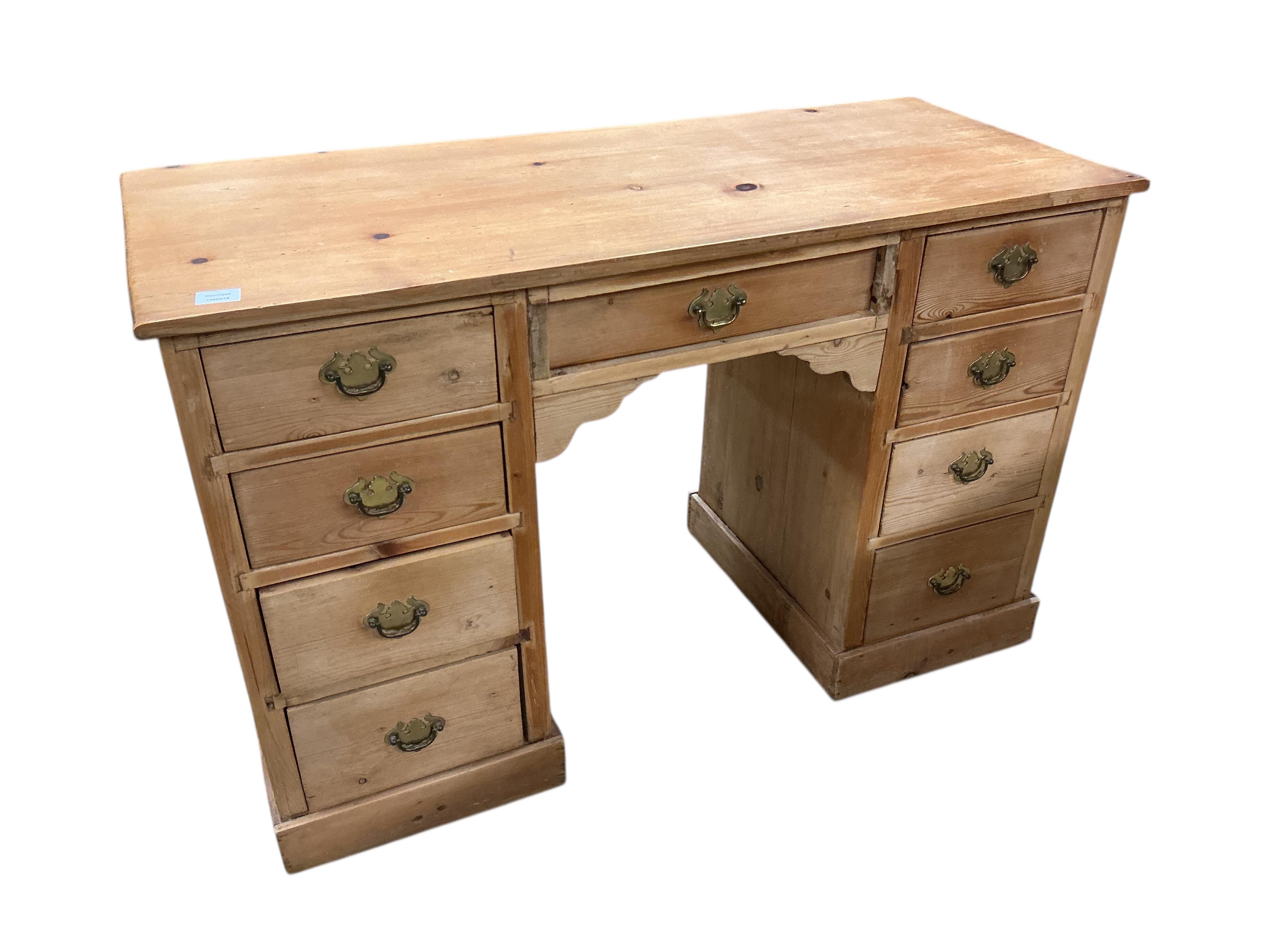 A late Victorian pine kneehole dressing table, width 122cm, depth 51cm, height 78cm